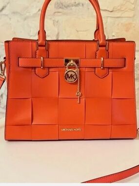 New with tag Michael Kors Bright Orange Woven Leather Satchel with Gold Hardware